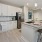 Well-lit kitchen with ample counter space