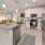 Well-lit kitchen with ample counter space