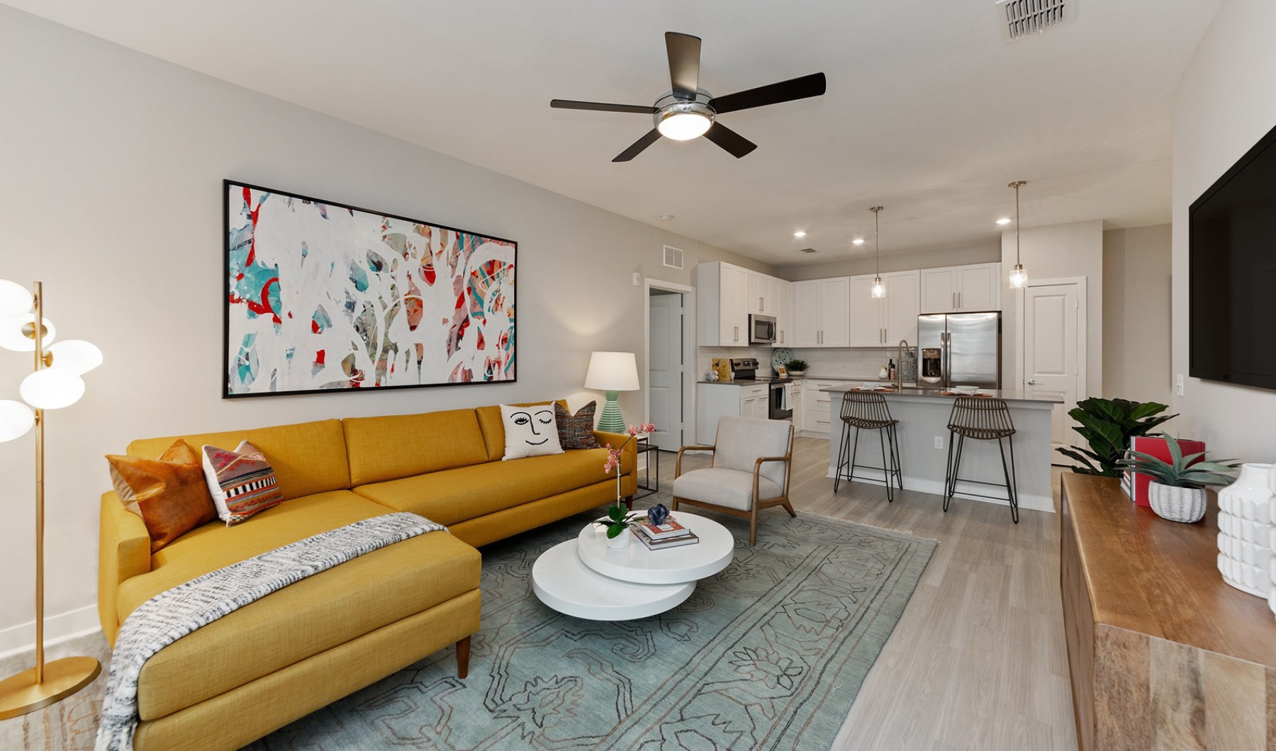 Your new home is waiting Open space living area with natural lighting