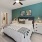 Bedroom with natural lighting and high ceilings