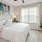 Bedroom with natural lighting and high ceilings