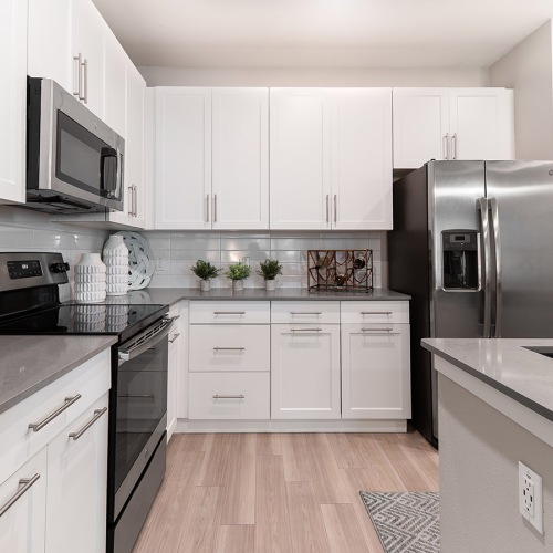 kitchen with white cabinets